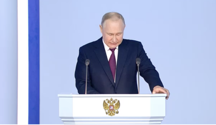 Vladimir Putin announcing the plans to suspend Russia's participation in the New START treaty during his February 2023 speech