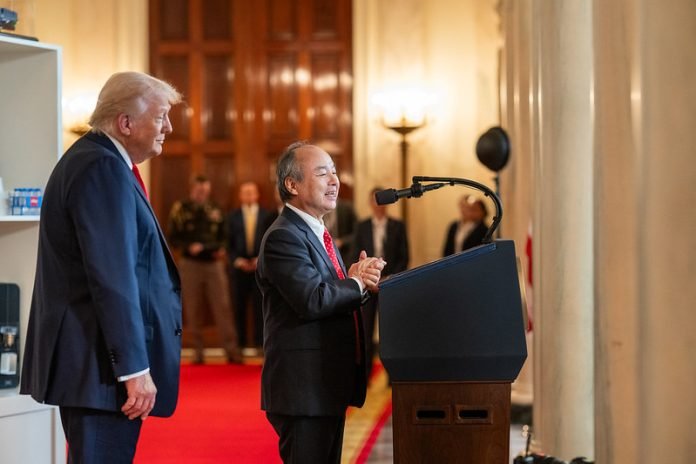 SoftBank CEO Masayoshi Son delivers remarks as President Donald Trump looks on during an “Investing in America” event, Wednesday, April 30, 2025